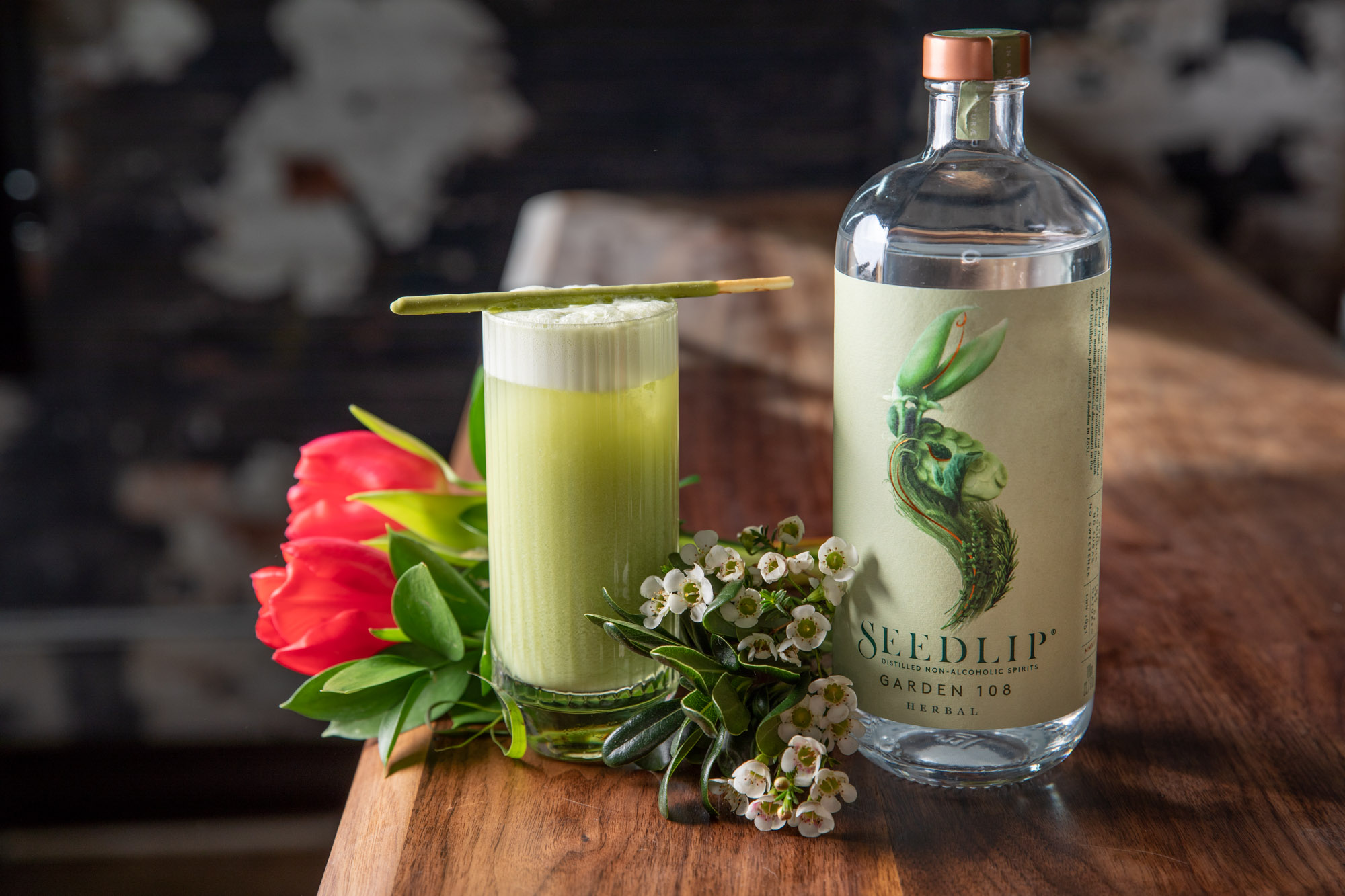 Cocktail photographed with flowers for Seedlip